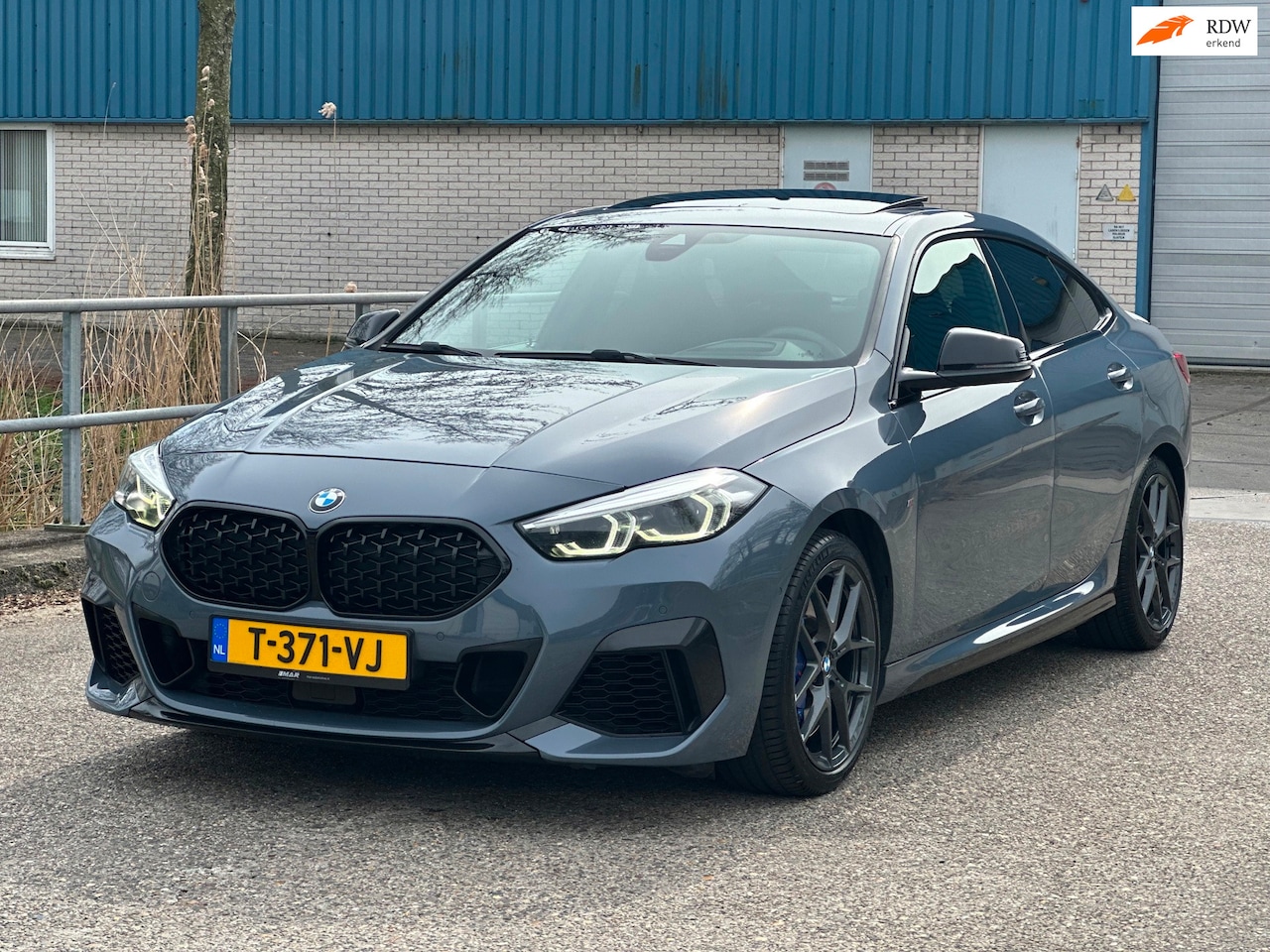 BMW 2-serie Gran Coupé - M235i xDrive High Executive pano! Head up! Harmon kardon - AutoWereld.nl