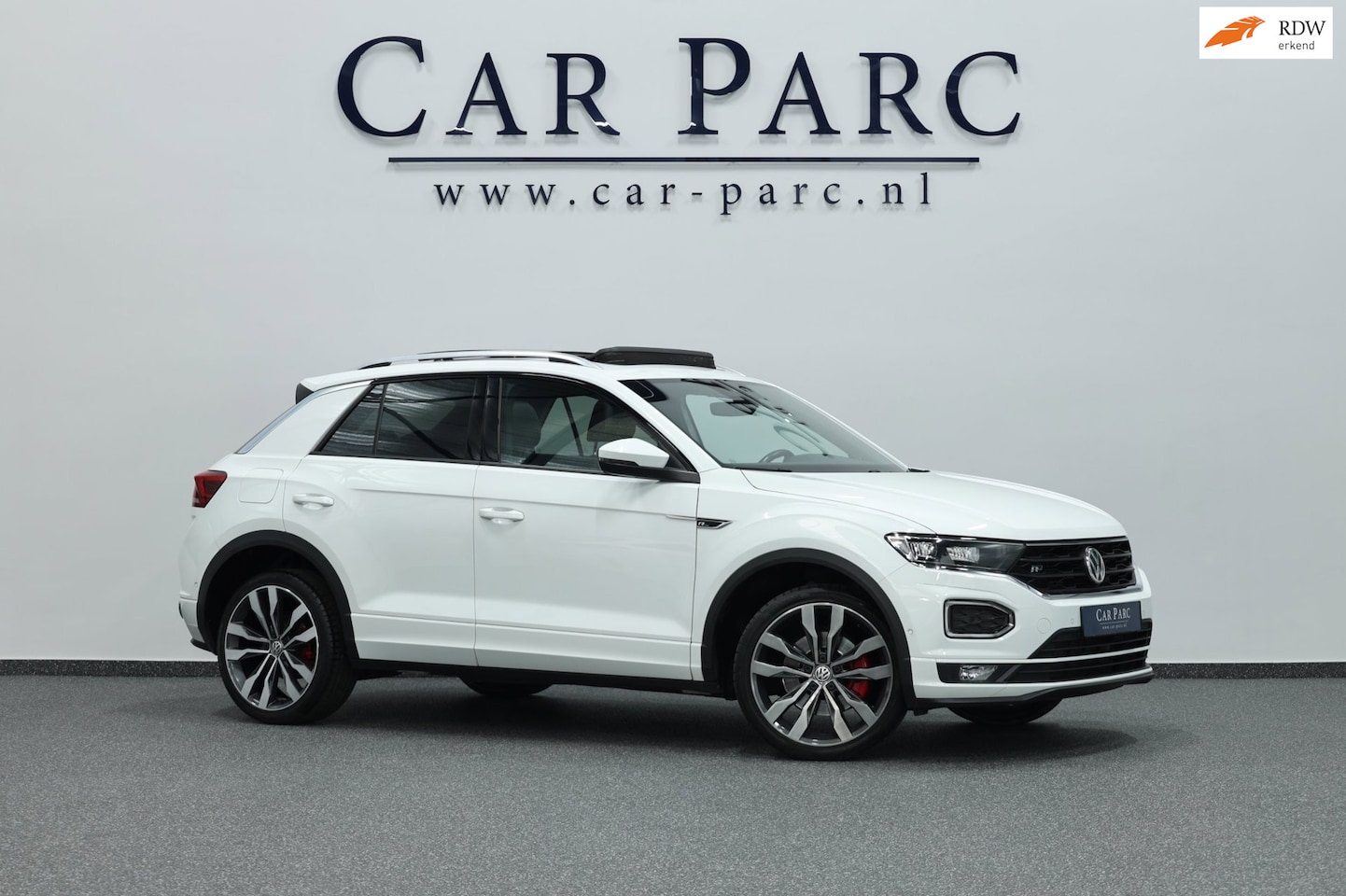Volkswagen T-Roc - 2.0 TSI 4Motion 3x R-line LED/VIRTUAL/PANO/HALF LEDER+S.VERWARMING/19" LMV/CAM/ACC/ECC/12 - AutoWereld.nl