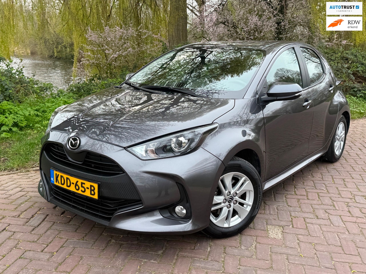 Mazda 2 Hybrid - 1.5 Centre-line 1 Ei. 49000 km b.j. 12-2023 ,Camera 15"lm ,carplay - AutoWereld.nl