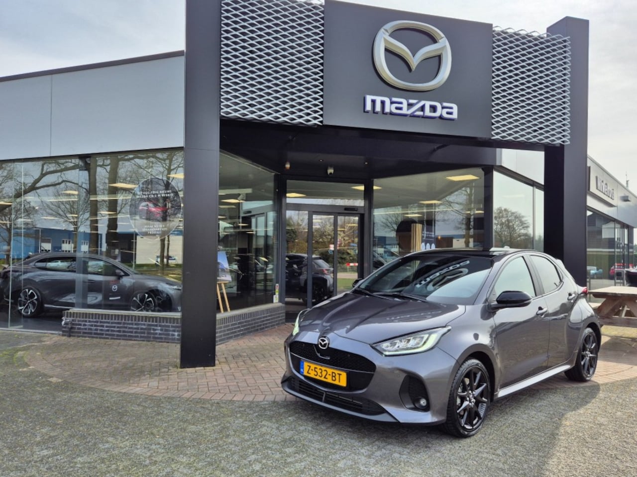 Mazda 2 Hybrid - MAZDA 2 1.5 116 HYBRID HOMURA PLUS / Carplay - AutoWereld.nl