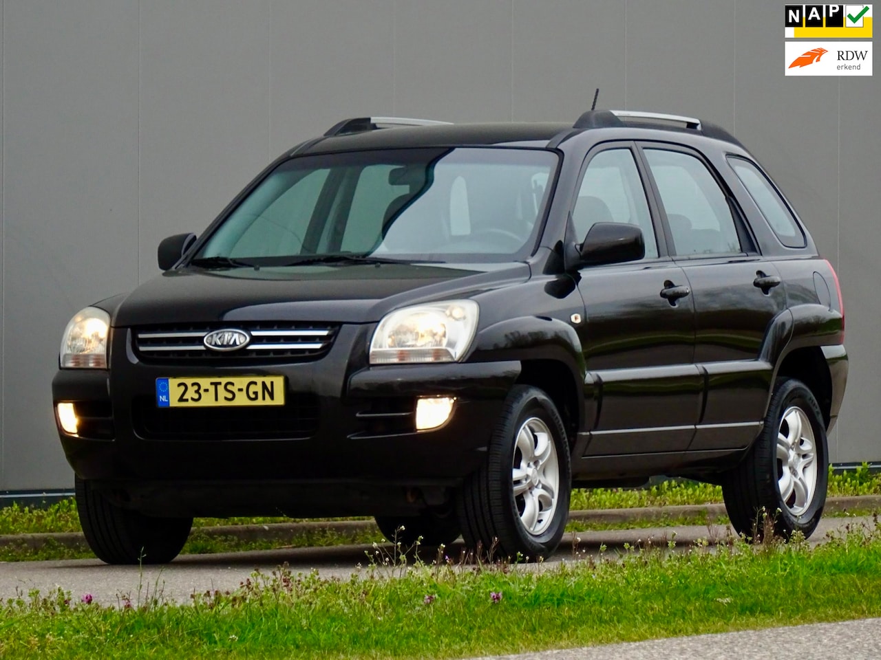 Kia Sportage - 2.0 CVVT | 1/2/ Leer | 121.023 NAP | Trekhaak | NL-Auto | - AutoWereld.nl