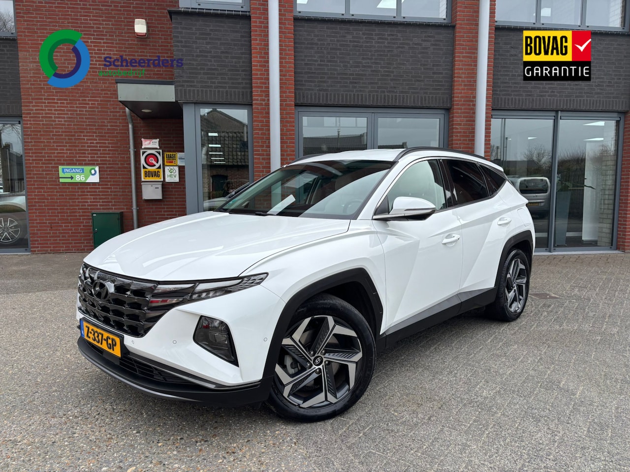 Hyundai Tucson - 1.6 T-GDI PHEV Premium 4WD 1.6 T-GDI PHEV Premium 4WD,360 camera,leder,1 jaar garantie - AutoWereld.nl
