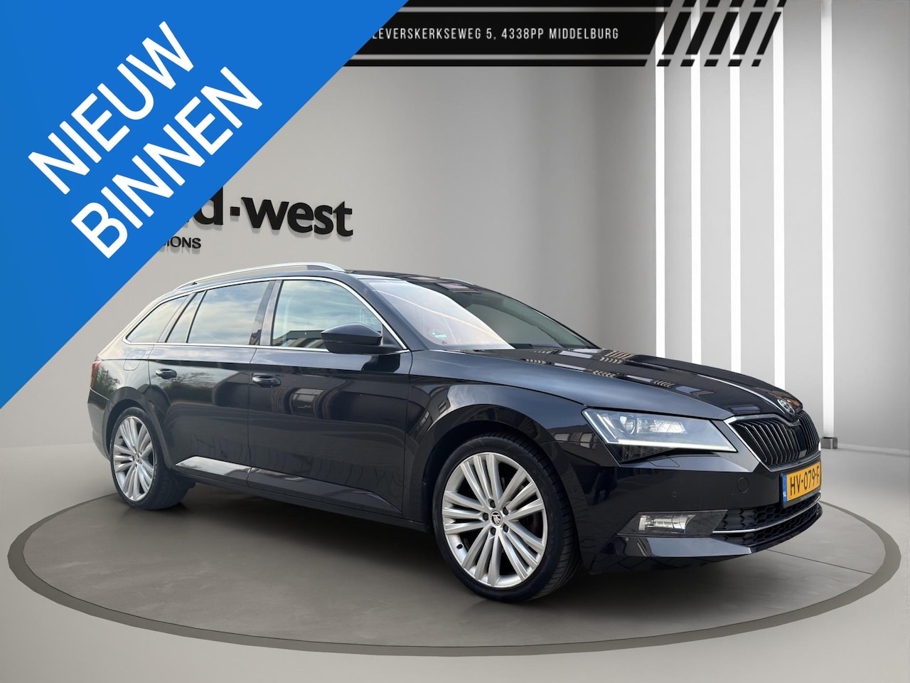 Skoda Superb Combi - 1.6 TDI Style Business Automaat Memory Camera - AutoWereld.nl