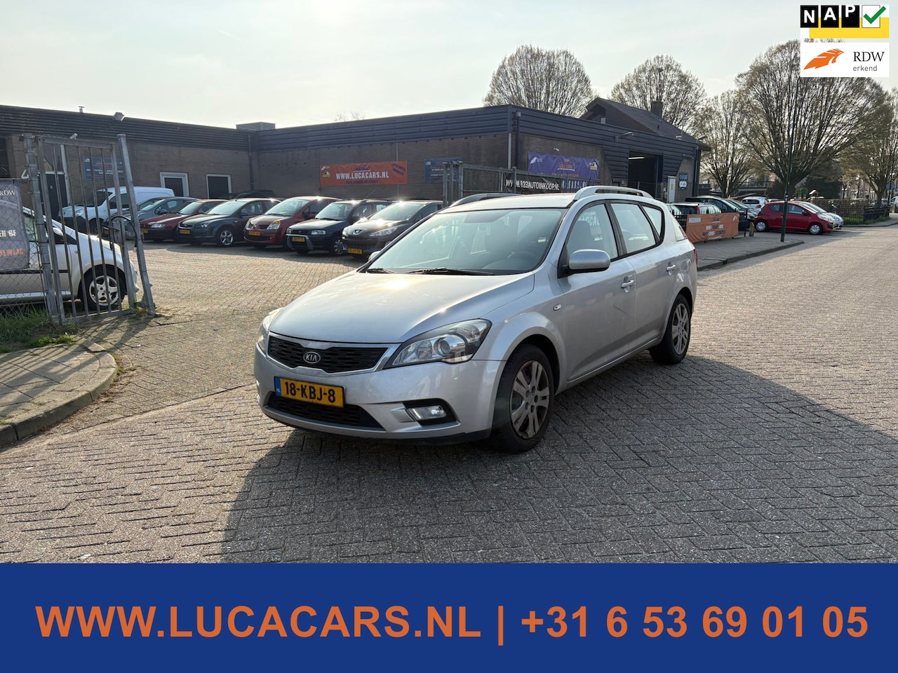 Kia Cee'd Sporty Wagon - 1.4 CVVT X-ecutive 1.4 CVVT X-ecutive - AutoWereld.nl