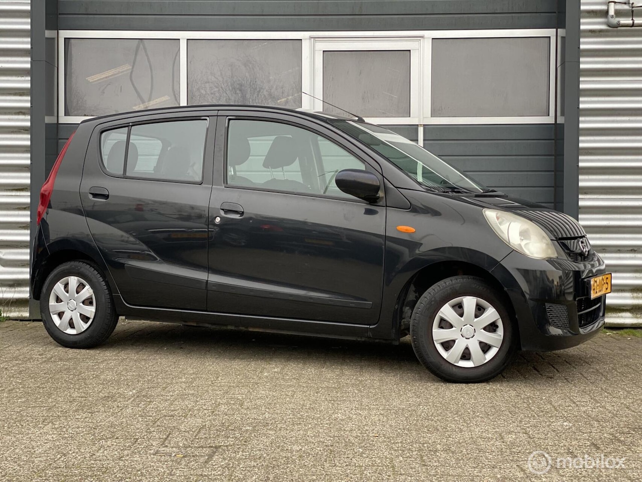 Daihatsu Cuore - 1.0 Trend 2009 5 Deurs|100% O-houd|Stuurbekr| - AutoWereld.nl