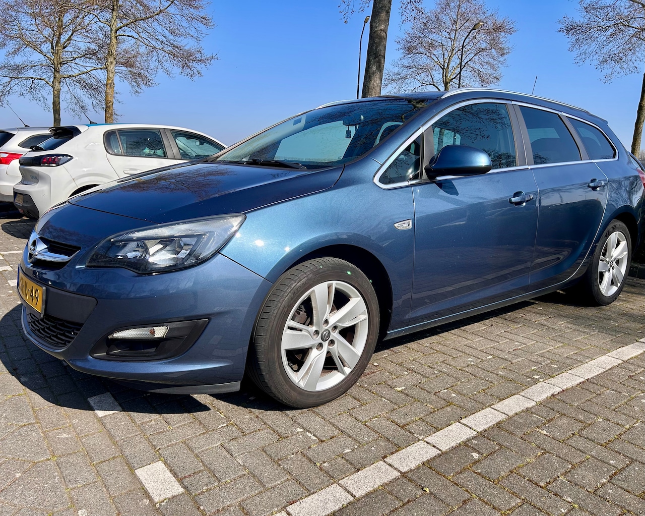 Opel Astra Sports Tourer - 1.4 Turbo Rhythm - AutoWereld.nl