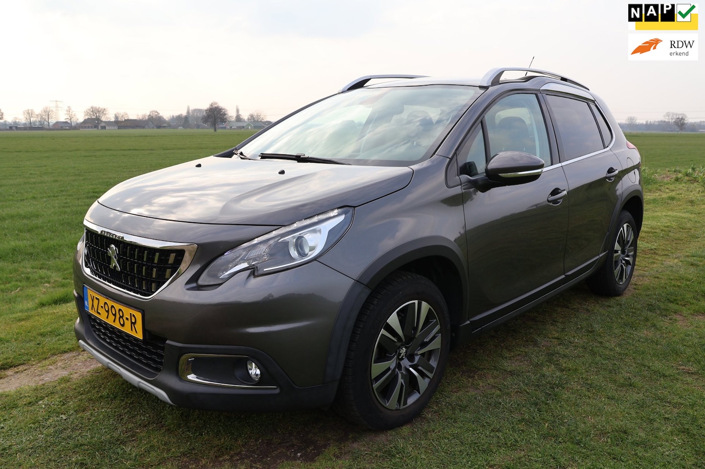 Peugeot 2008 - 1.2 PureTech Allure|Automaat|Carplay|Pano-Dak|Achteruitrijcamera|NL-auto-NAP! - AutoWereld.nl