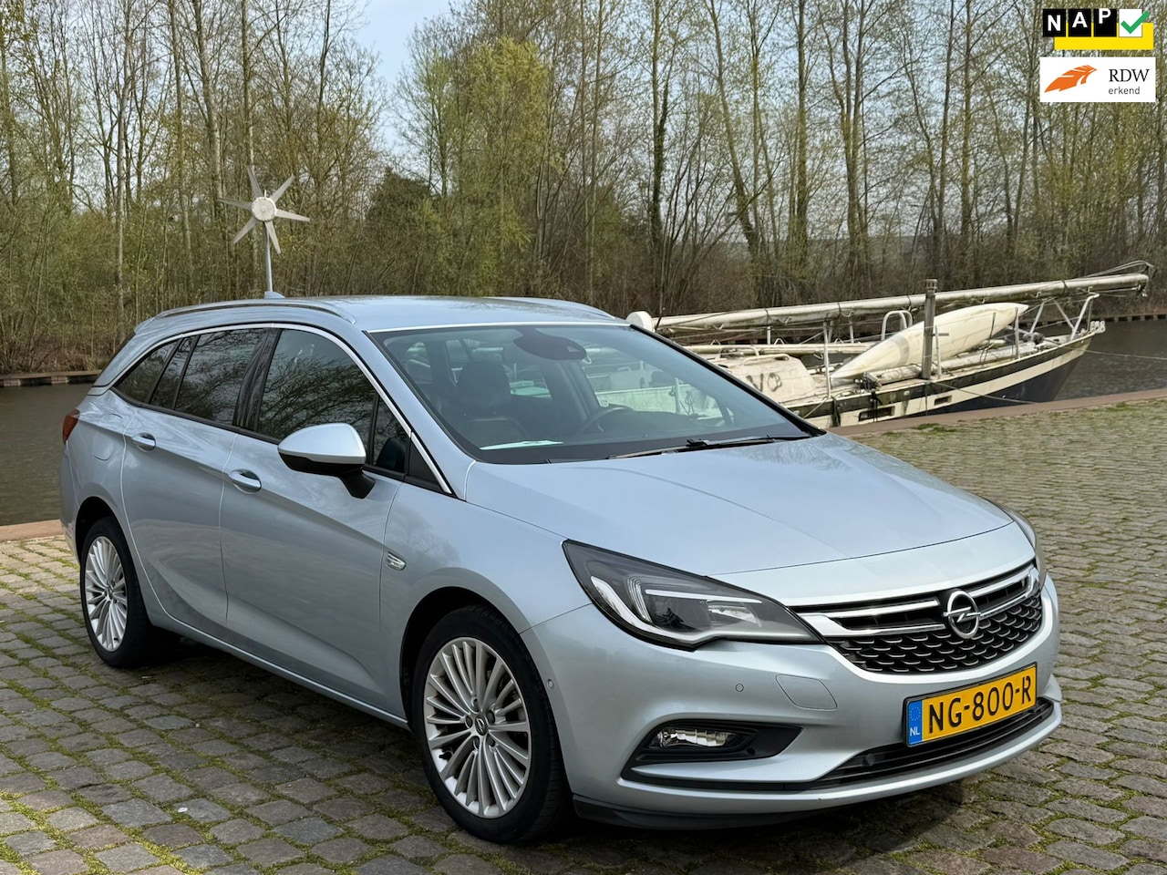 Opel Astra Sports Tourer - 1.0 Innovation Dealer onderhouden airco cruis control navigatie parkeer sensor - AutoWereld.nl