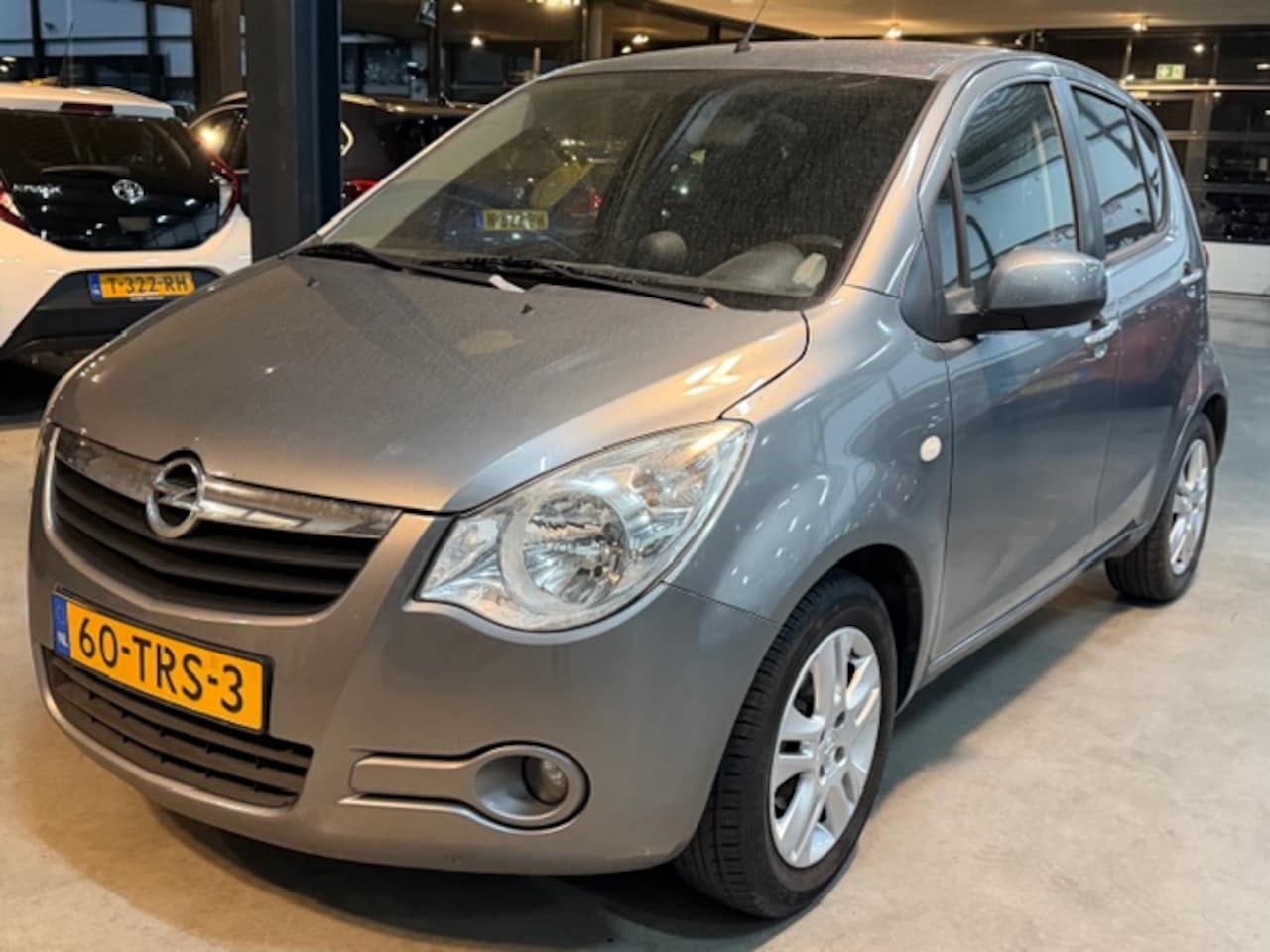 Opel Agila - 1.0 12V 68pk Edition 1e eigenaar apk april 2027 koppeling hoorbaar - AutoWereld.nl