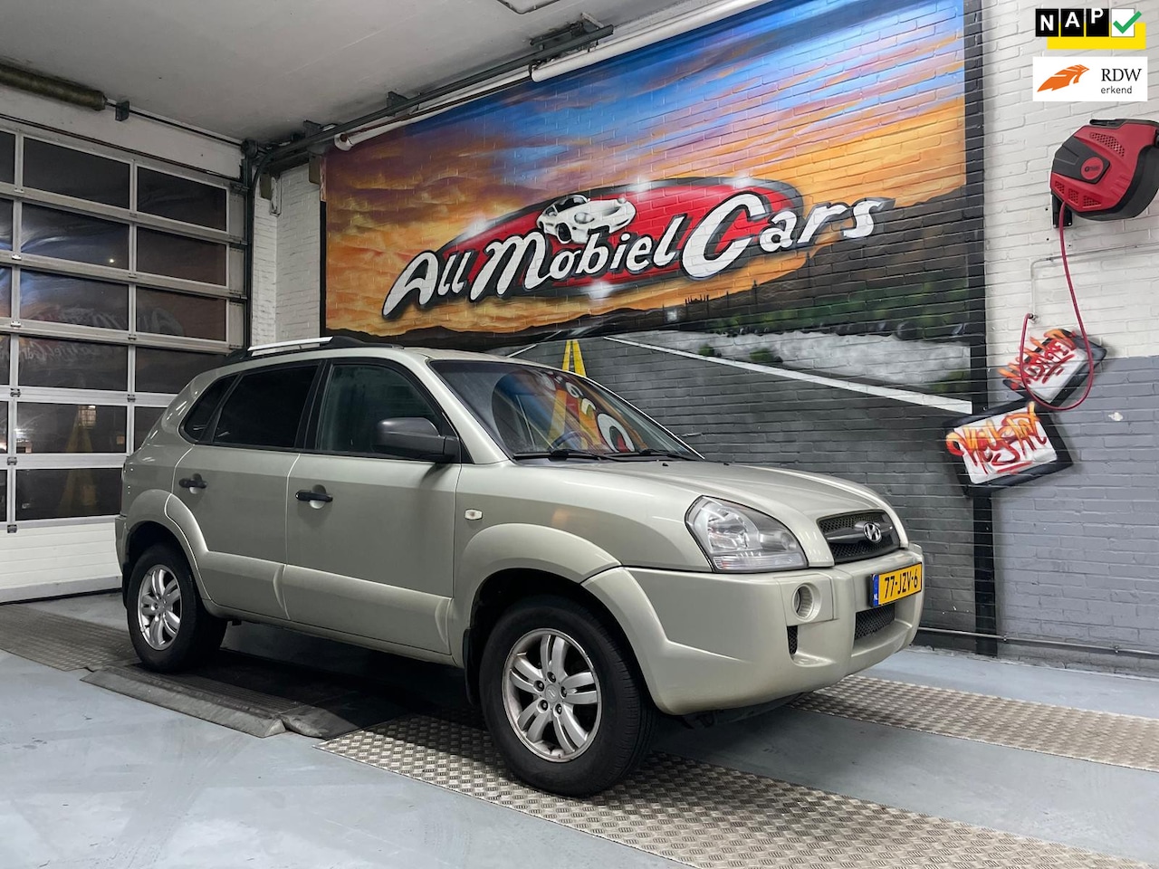 Hyundai Tucson - 2.0i Dynamic Executive 2.0i Dynamic Executive - AutoWereld.nl