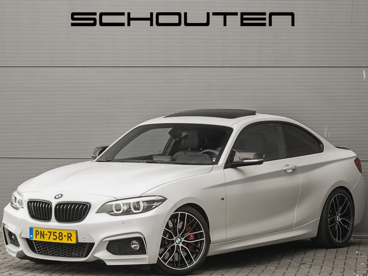 BMW 2-serie Coupé - 220i High Ex M-Sport Schuifdak M-Performance H/K Trekhaak - AutoWereld.nl
