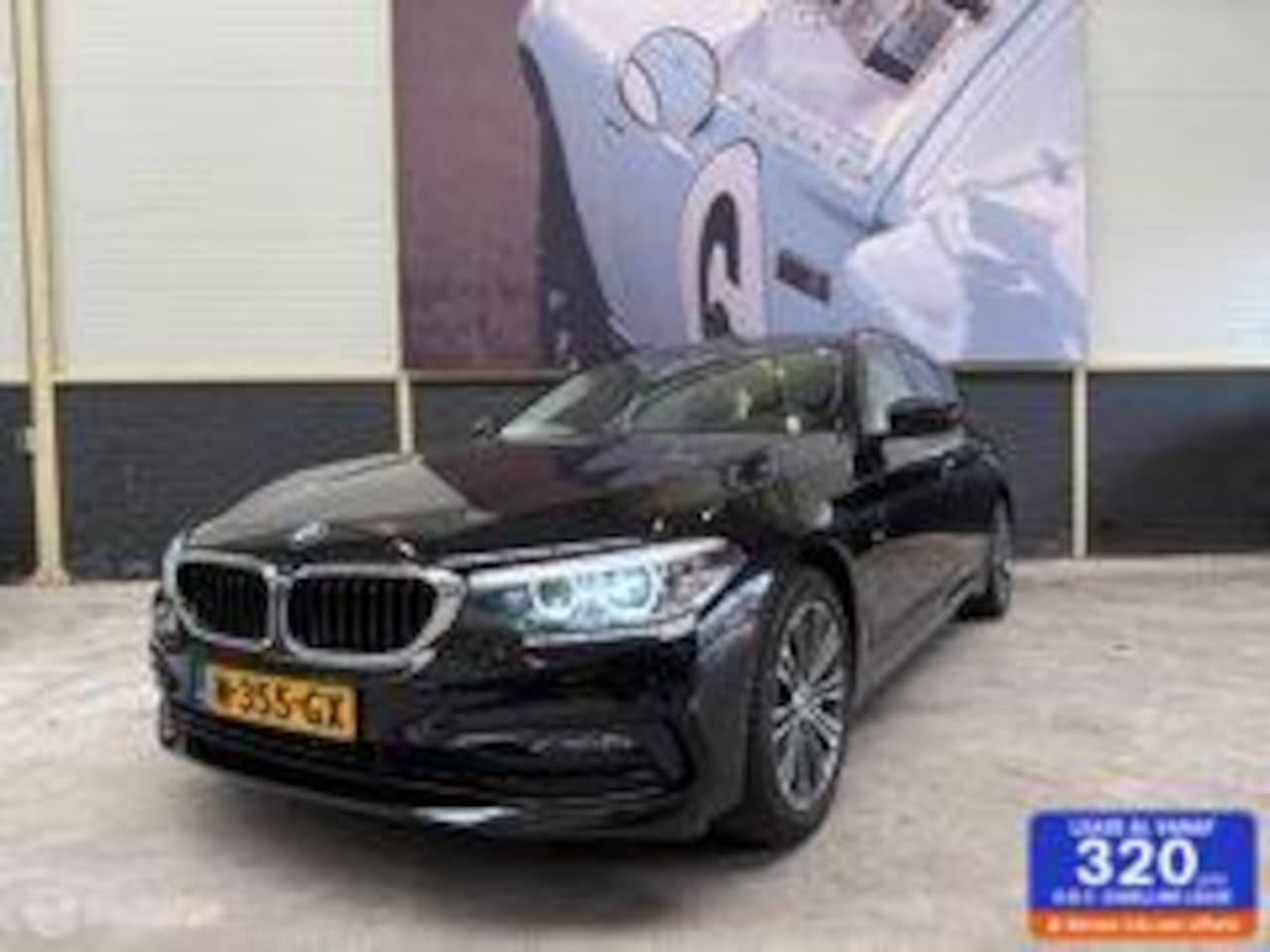 BMW 5-serie Touring - 520d Sportline Camera Blackpack H&K - AutoWereld.nl
