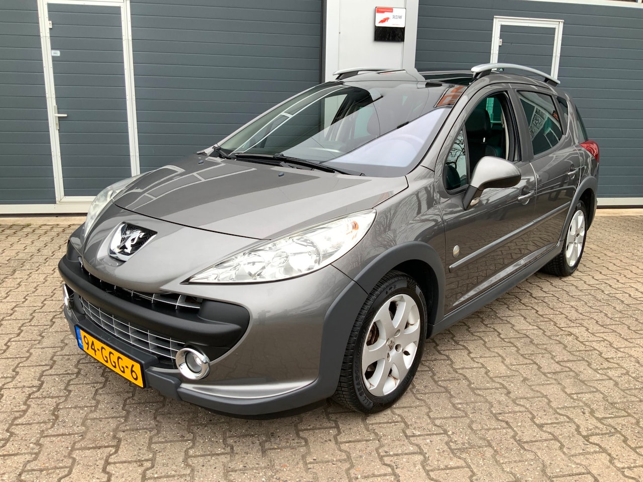 Peugeot 207 SW Outdoor - 1.6 VTi Leder Panodak Navi Trekh. - AutoWereld.nl