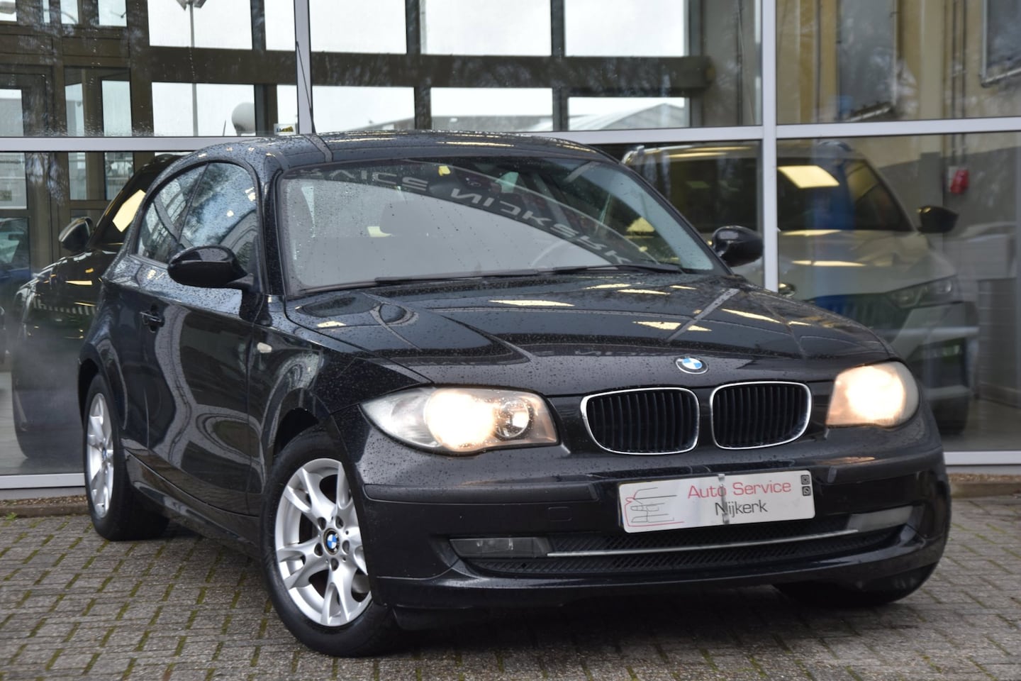 BMW 1-serie - 118i Business Line Airco Elek. Ramen Lm-Velgen 1ste Eigenaar - AutoWereld.nl