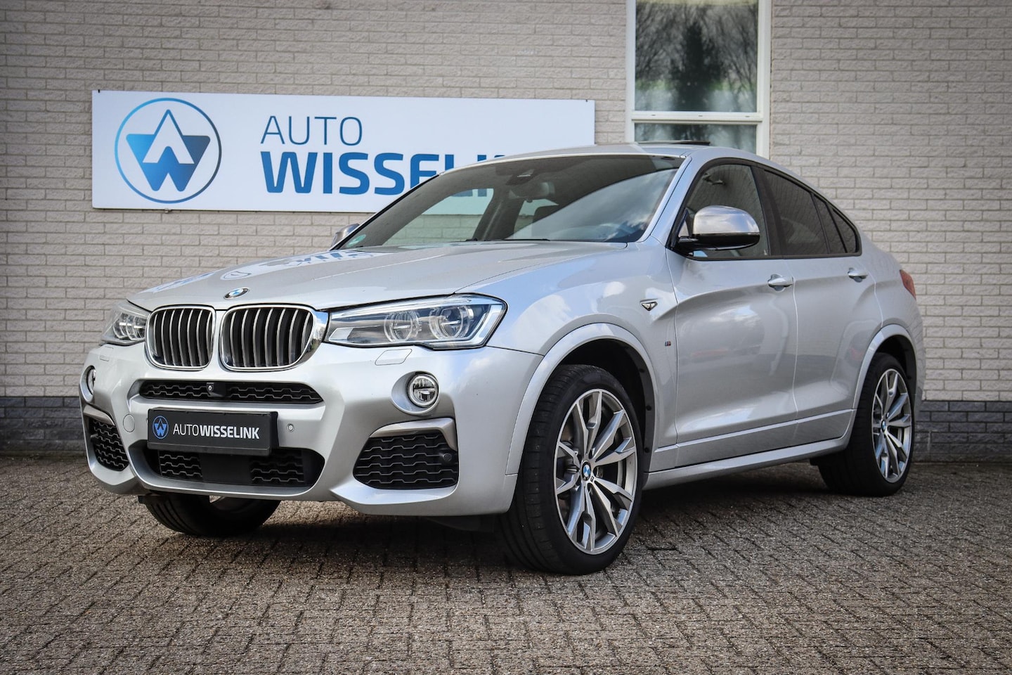 BMW X4 - M40i High Executive HUD/Panoramadak/Memory Sportstoelen/Led/Trekhaak - AutoWereld.nl