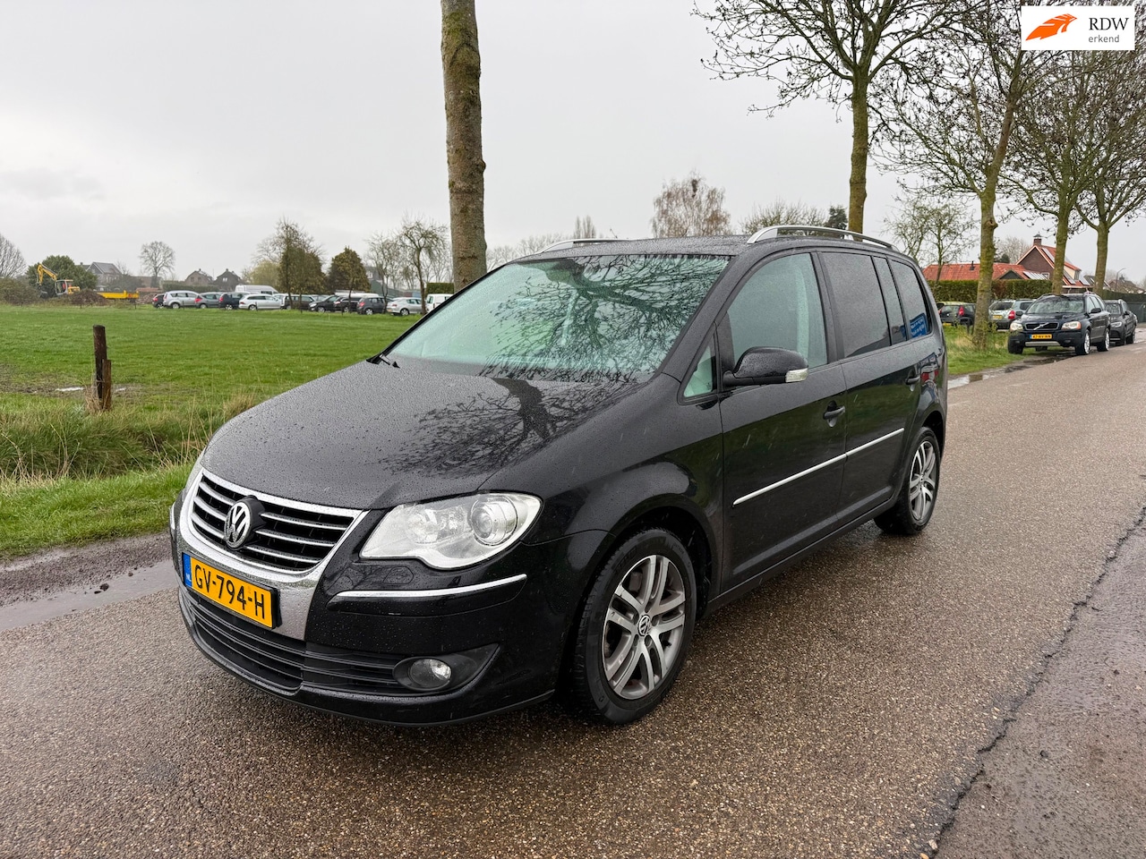 Volkswagen Touran - 1.4 TSI Highline Automaat/7-Persoons/ 170 Pk/Trekhaak - AutoWereld.nl