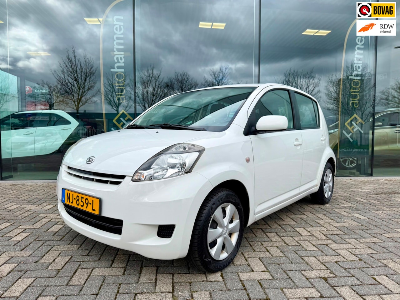 Daihatsu Sirion 2 - 1.0-12V Slim 1.0-12V Slim, Airco, 5-deurs, IsoFix - AutoWereld.nl