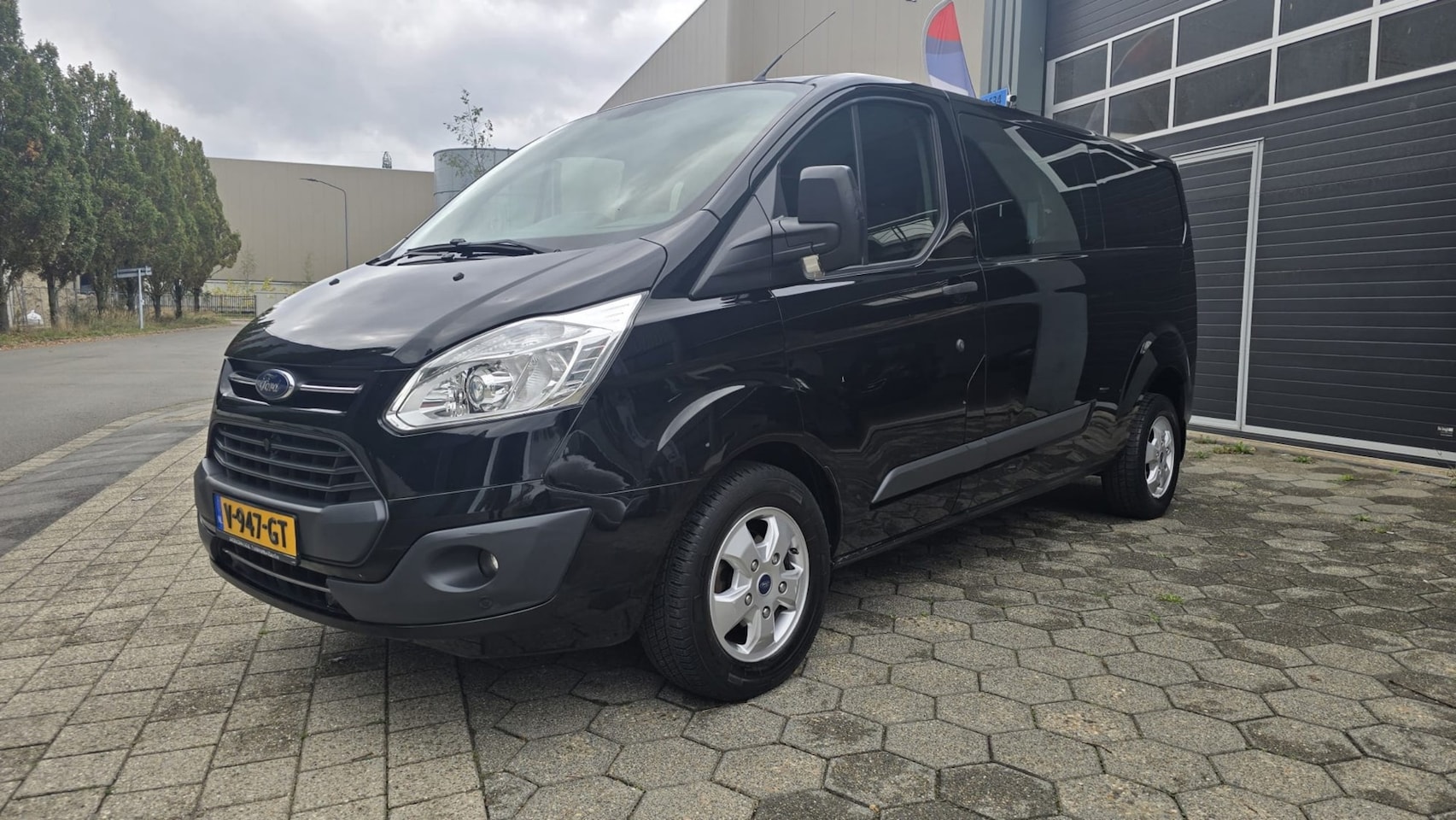 Ford Transit Custom - 310 2.0 TDCI L2H1 Trend DC/ APK / AIRCO / 6 persoons - AutoWereld.nl