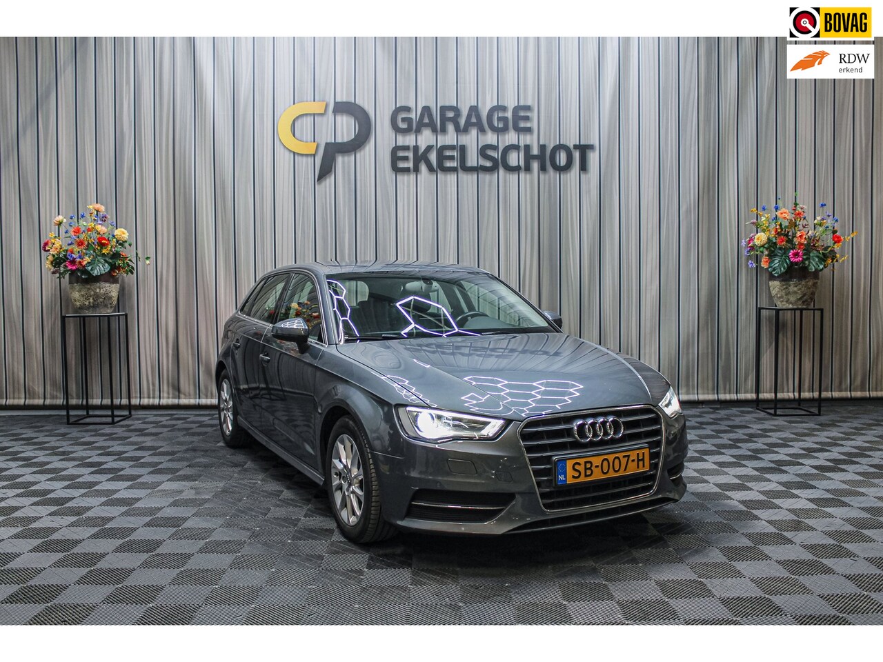 Audi A3 Sportback - 1.6 TDI|Cruise|Stoelverw|Navi|Leer|PDC V+A - AutoWereld.nl