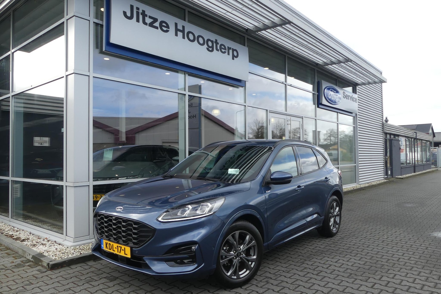 Ford Kuga - 1.5 EcoBoost ST-Line X ELEKT. TREKHAAK (1.800KG), HUD, WINTER PACK, ADAPT. CRUISE, CLIMA, - AutoWereld.nl