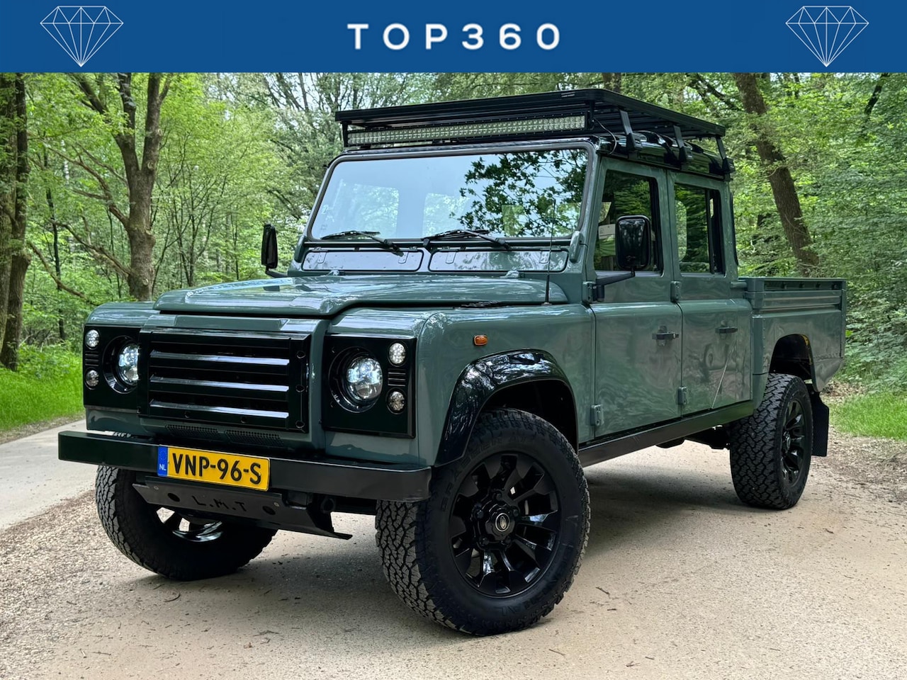Land Rover Defender 130 - 2.5 Td5 SW 130" SE Keswick Green | Sawtooth | Ledbar | Roofrack - AutoWereld.nl