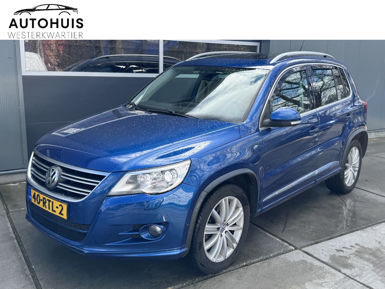 Volkswagen Tiguan - 2.0 TSI 200pk DSG Sport&Style R-line 4Motion Panoramadak Trekhaak Navigatie Camera Leer Xe - AutoWereld.nl