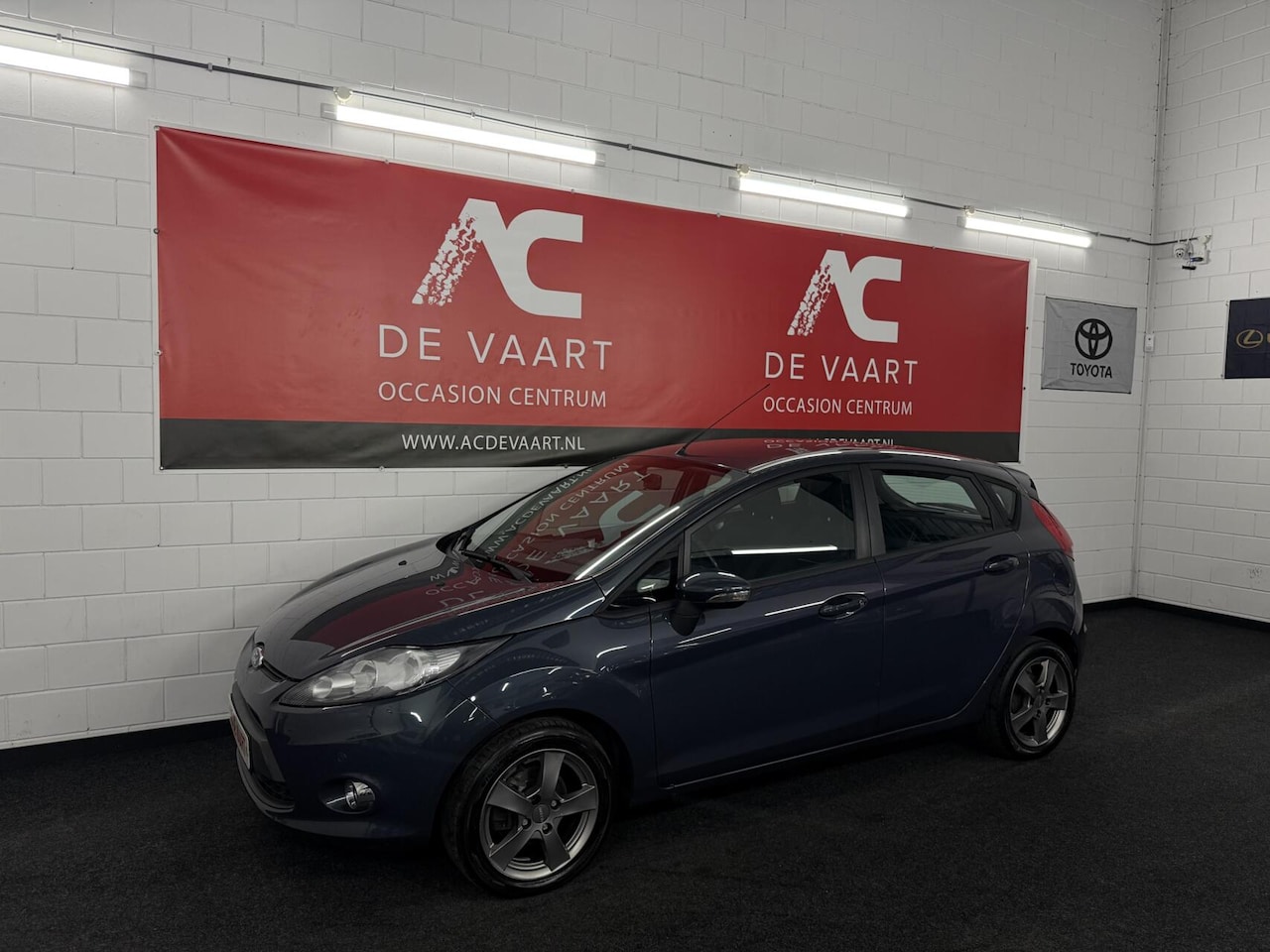 Ford Fiesta - 1.4 Titanium - AUTOMAAT/5DRS/AIRCO/PDC/NAP - AutoWereld.nl