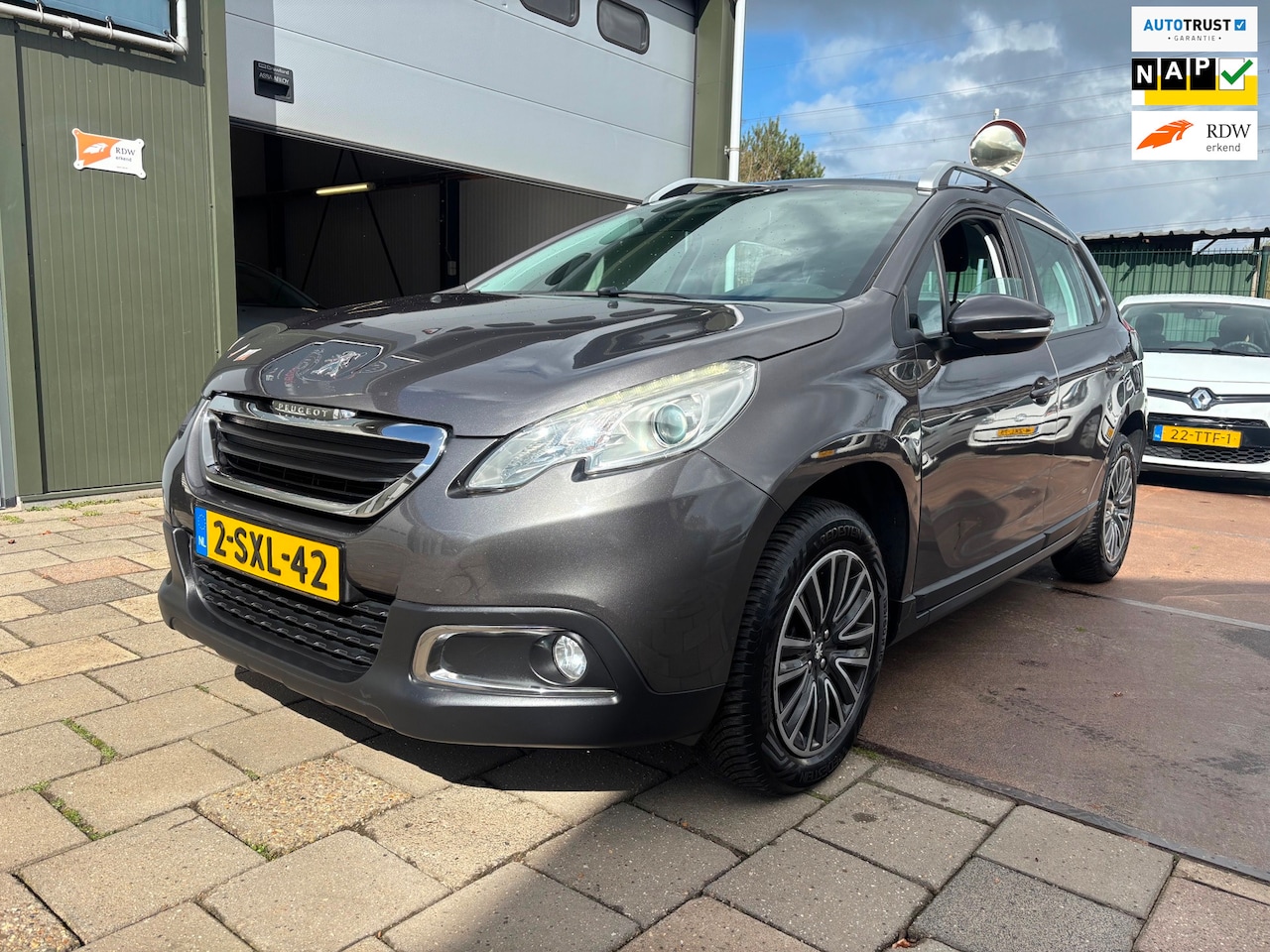 Peugeot 2008 - 1.2 VTi Blue Lease Navi Airco Cruise - AutoWereld.nl