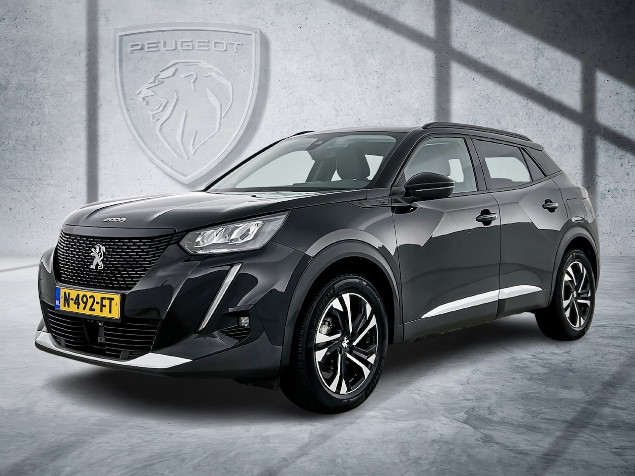 Peugeot e-2008 - EV Allure Pack 50 kWh | Rijklaar | Stoelverwarming | 360 camera | navigatie - AutoWereld.nl