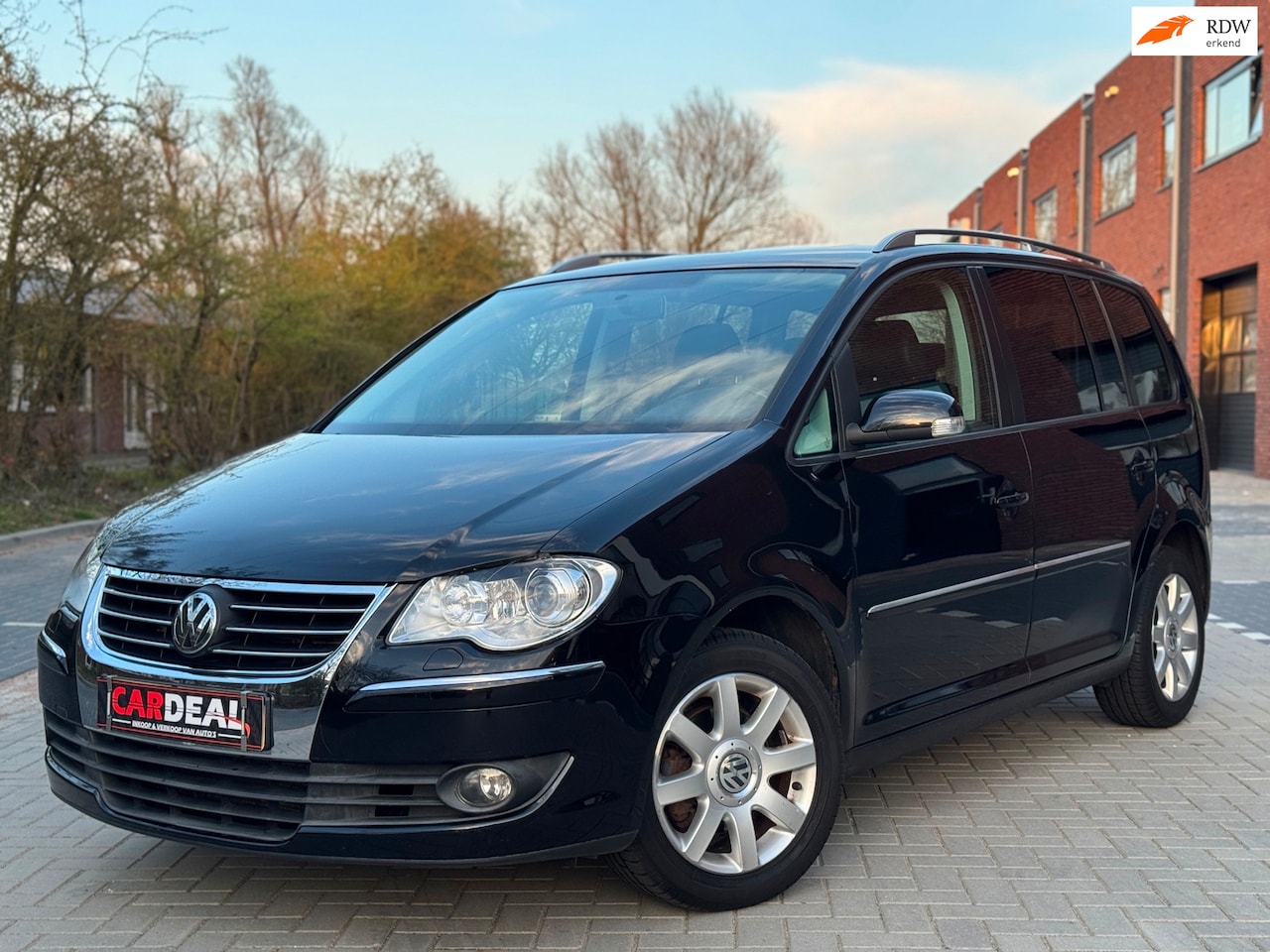 Volkswagen Touran - 1.4 TSI Optive AUTOMAAT|PANO|NAVI|LEDER|LMV - AutoWereld.nl