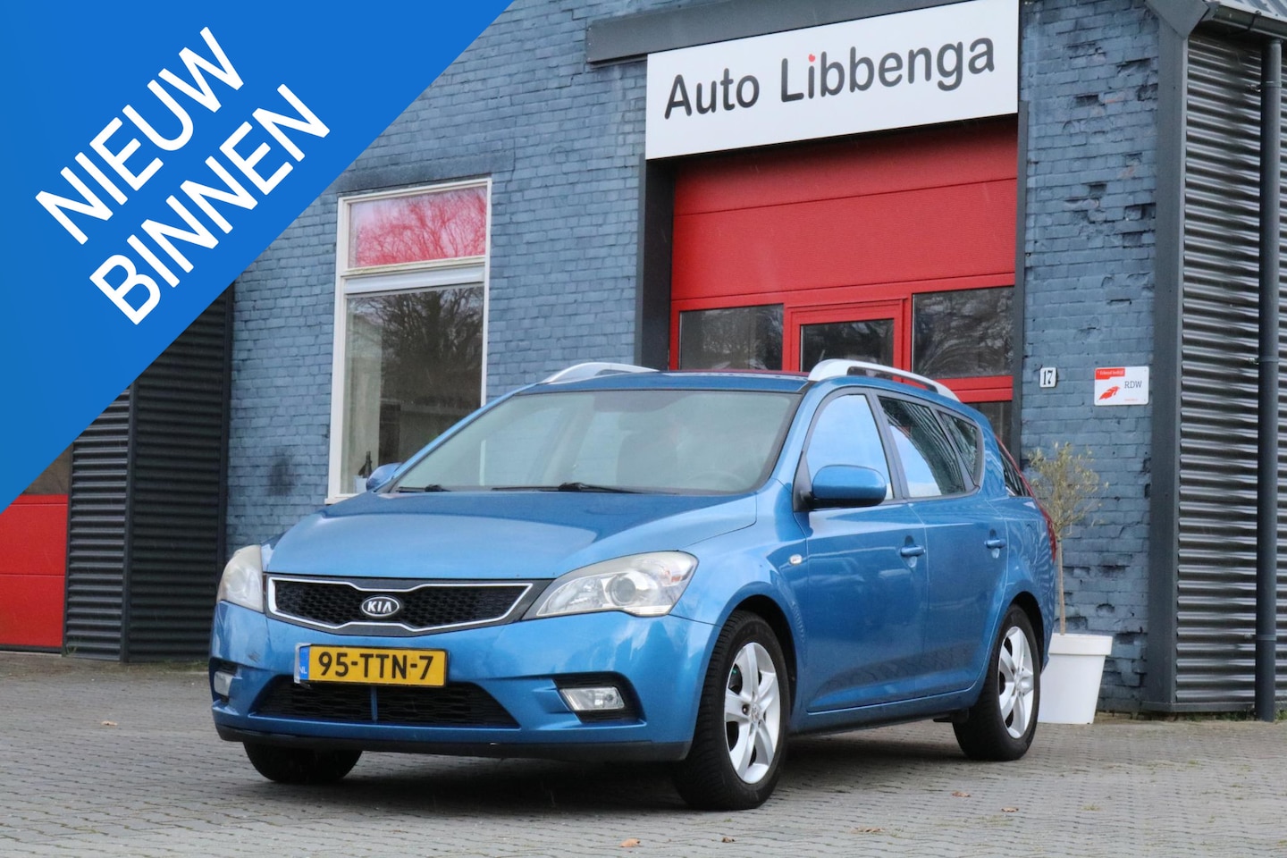 Kia Cee'd Sporty Wagon - 1.4 CVVT Navigator Plus Pack 1.4 CVVT Navigator Plus Pack - AutoWereld.nl