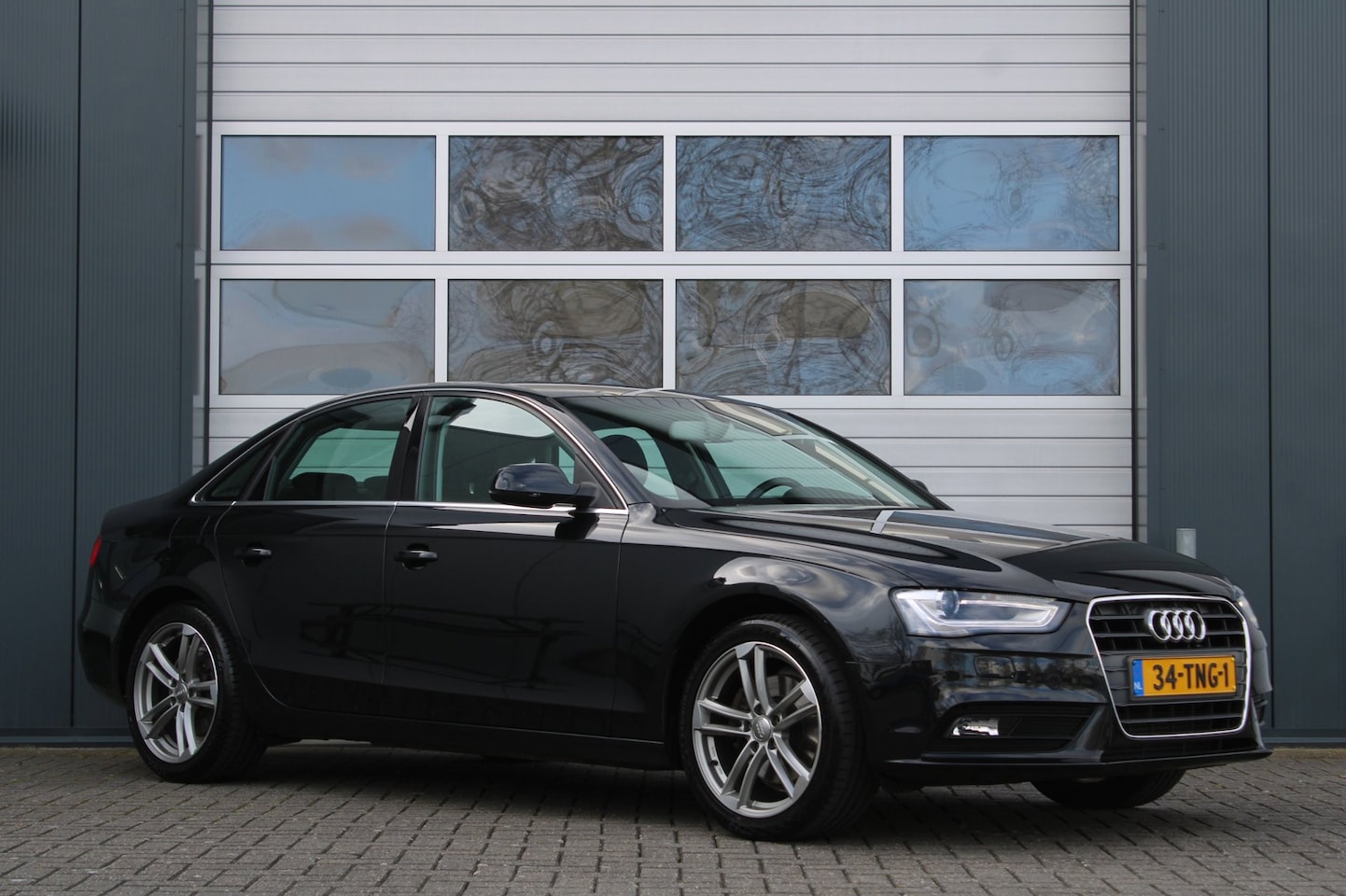Audi A4 Limousine - 1.8 TFSI Pro Line Business 170pk Clima/Cruise/Bi-Xenon/Navi/Bluetooth/RadioCD.AUX/18"LM/Go - AutoWereld.nl