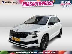 Skoda Karoq - 1.5 TSI ACT Sportline Business / TREKHAAK/ STUUR+STOELVERWARM.V+A/ PARK.SENSOR.V+A/ CAMERA