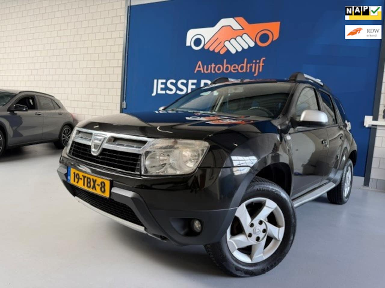 Dacia Duster - 1.6 Aniversare 2wd 1.6 Aniversare 2wd,bj.2012,kleur:zwart,airco,leder,sportvelgen,APK 03/2027,NAP 214703 km.n - AutoWereld.nl