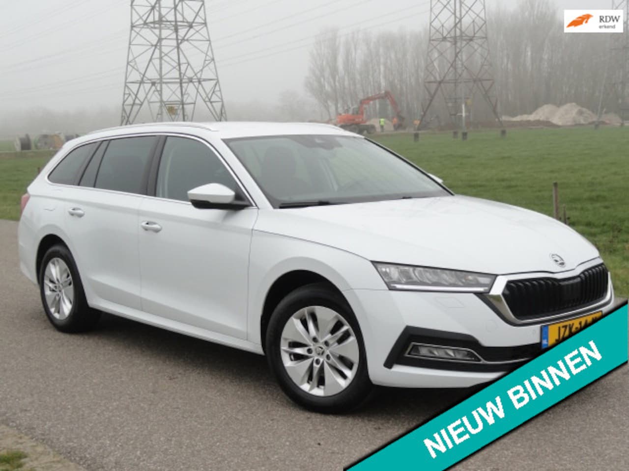 Skoda Octavia Combi - 1.0TSI Business Edition Full LED I NAVIG I CAMERA I TREKHAAK - AutoWereld.nl