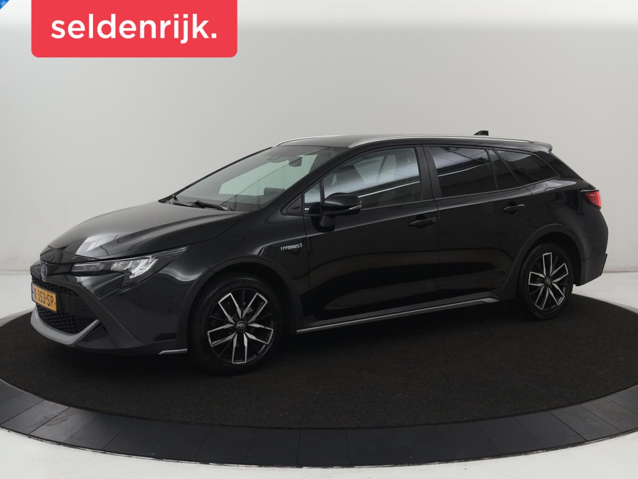 Toyota Corolla Touring Sports - 2.0 Hybrid Style | Stoelverwarming | Cruise Control | Navigatie | Camera | Carplay | Full - AutoWereld.nl