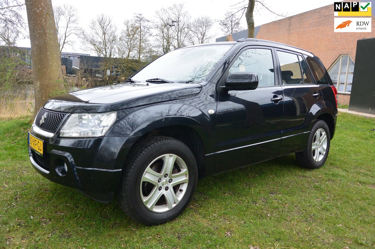 Suzuki Grand Vitara - 2.0-16V Exclusive/4WD/airco/cruise/navi/camera - AutoWereld.nl