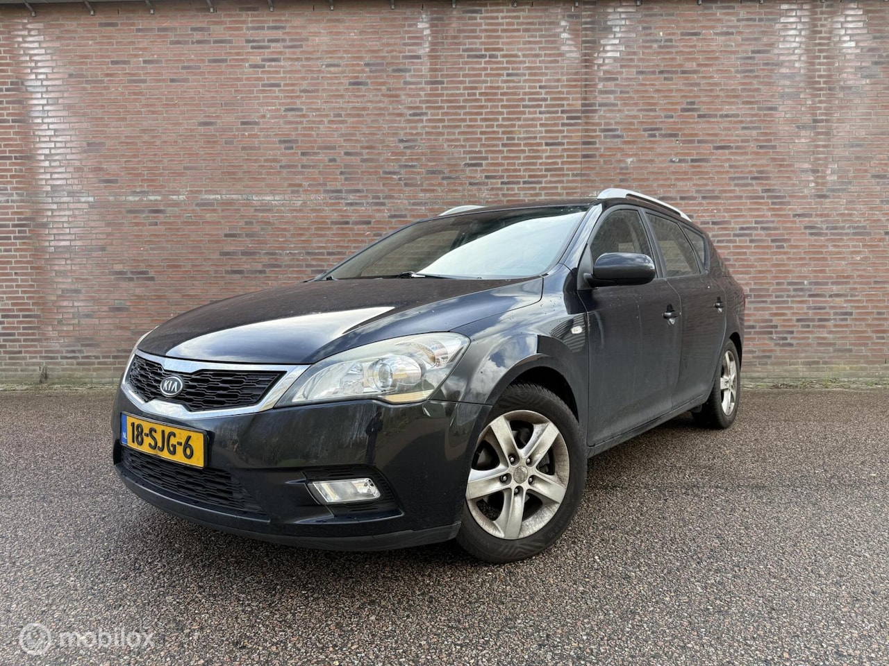 Kia Cee'd Sporty Wagon - 1.4 CVVT X-ecutive|Nap|Navi|Trekhaak - AutoWereld.nl