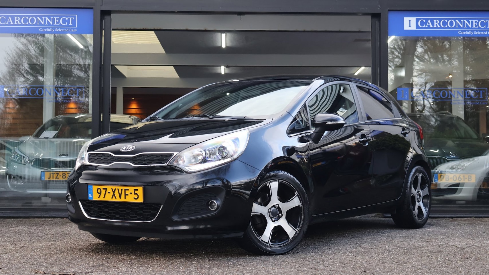 Kia Rio - 1.4 CVVT Super Pack|Cruise|Trekhaak||PDC|Camera|Clima - AutoWereld.nl