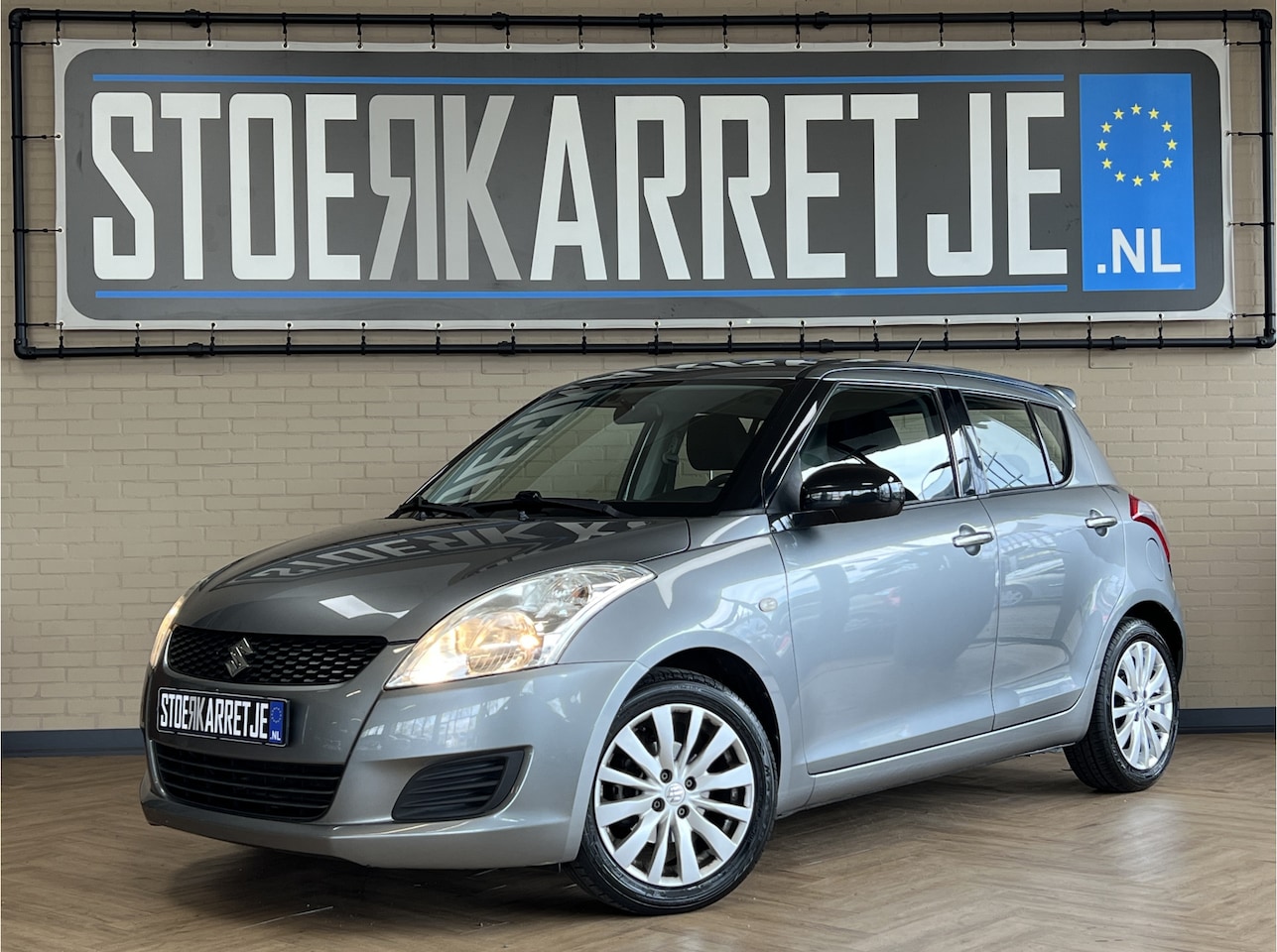 Suzuki Swift - 1.2 Bandit EASSS Cruise Control | 16" | Airco | Stoelverwarming | - AutoWereld.nl