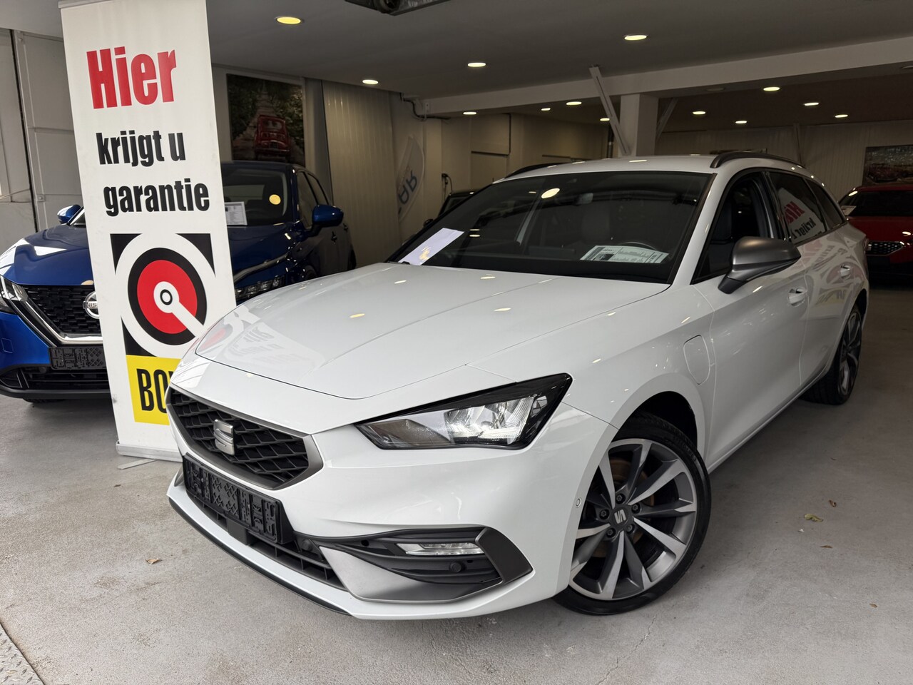 SEAT Leon Sportstourer - 1.4 TSI eHybrid PHEV FR Business Intense SOH 93% - AutoWereld.nl