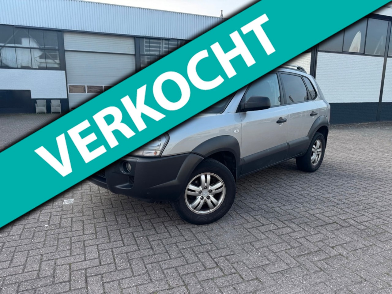 Hyundai Tucson - 2.0i Active Airco - AutoWereld.nl