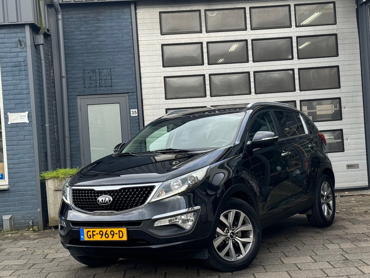 Kia Sportage - 1.6 GDI BusinessLine | Clima | Camera | Navi | N.A.P - AutoWereld.nl