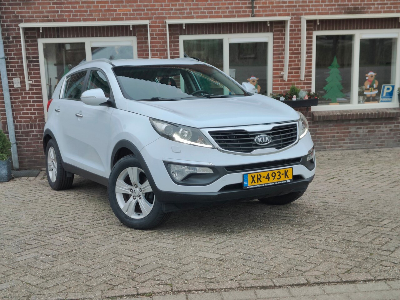 Kia Sportage - 2.0 X-tra First Edition Aut. Cruise Tr. haak LMV - RIJKLAAR - - AutoWereld.nl