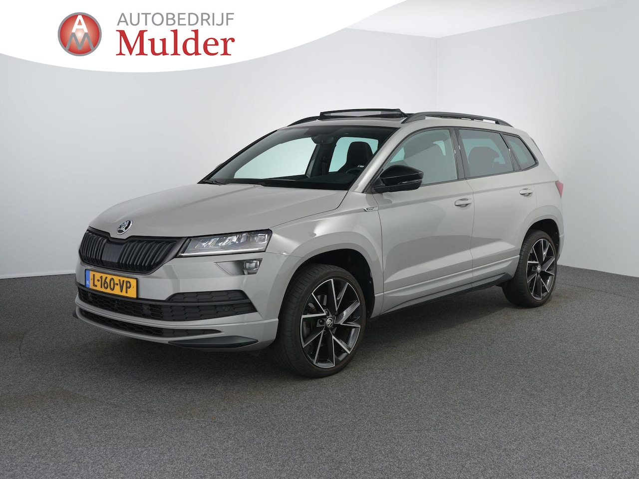 Skoda Karoq - 1.5 TSI ACT Sportline Business | Pano | Winterpakket | ACC | Keyless | Camera | Dodehoekse - AutoWereld.nl