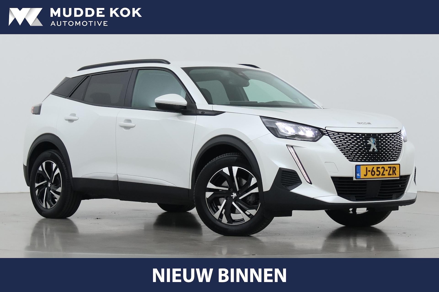 Peugeot e-2008 - EV Allure Première 1 fase 50 kWh | 360° Camera | Getint Glas | Apple Carplay | Keyless - AutoWereld.nl