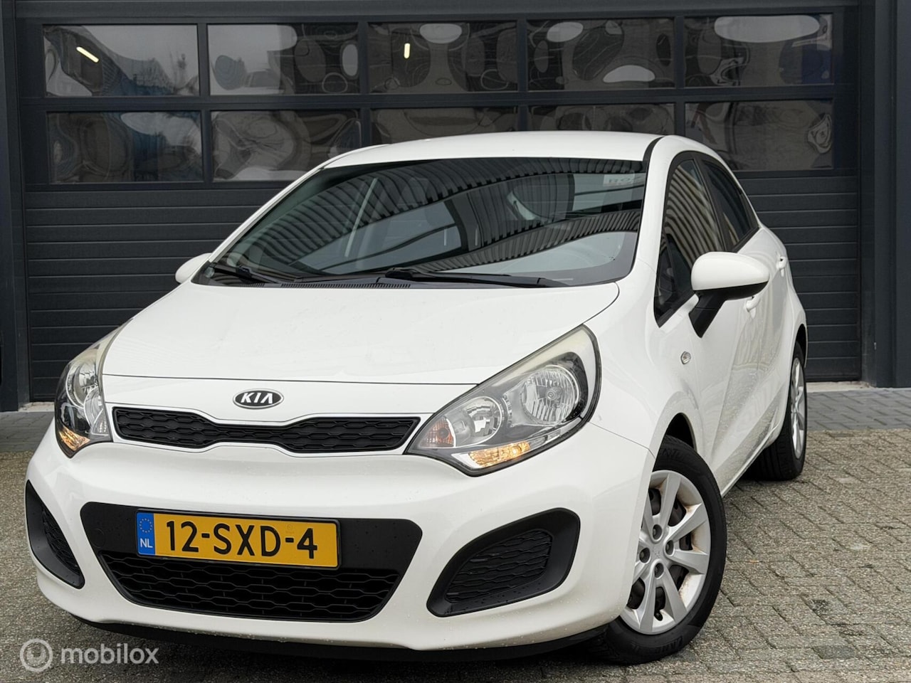 Kia Rio - 1.2 CVVT Comfort Pack | Sensoren | AC | Elektrische r - AutoWereld.nl