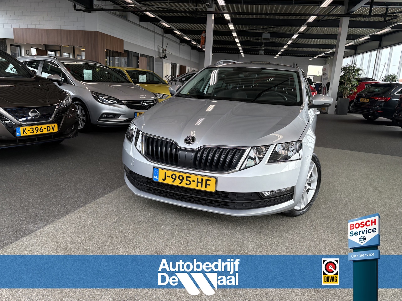 Skoda Octavia Combi - 1.0 TSi 115pk Business Edition LEDER/NAVI/CARPLAY/CRUISE/PDC/WINTERPACK - AutoWereld.nl