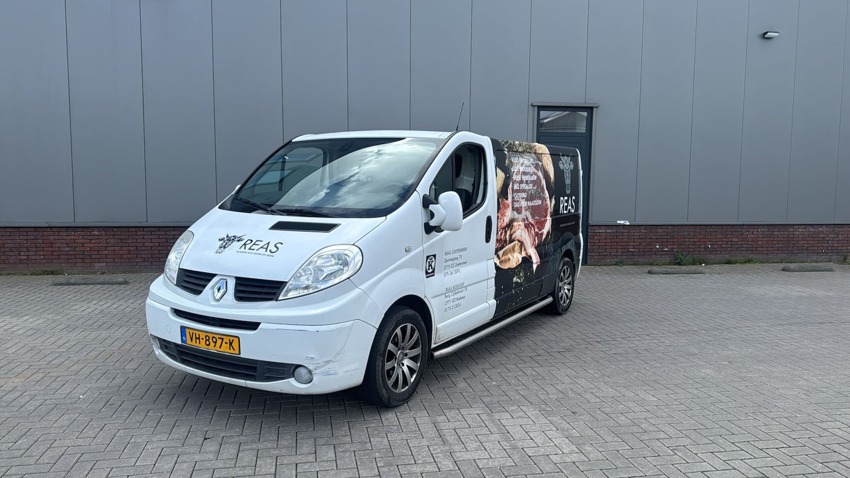 Renault Trafic - 2.0 dCi T29 L2H1 DC Eco 125.000 Nap Airco Lang Wit 2014 - AutoWereld.nl