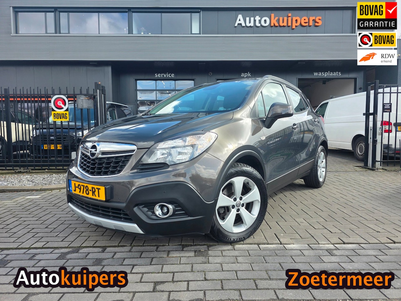 Opel Mokka - 1.6 Selection | Met o.a. achteruitrijcamera, navigatie, cruise control en airco! - AutoWereld.nl